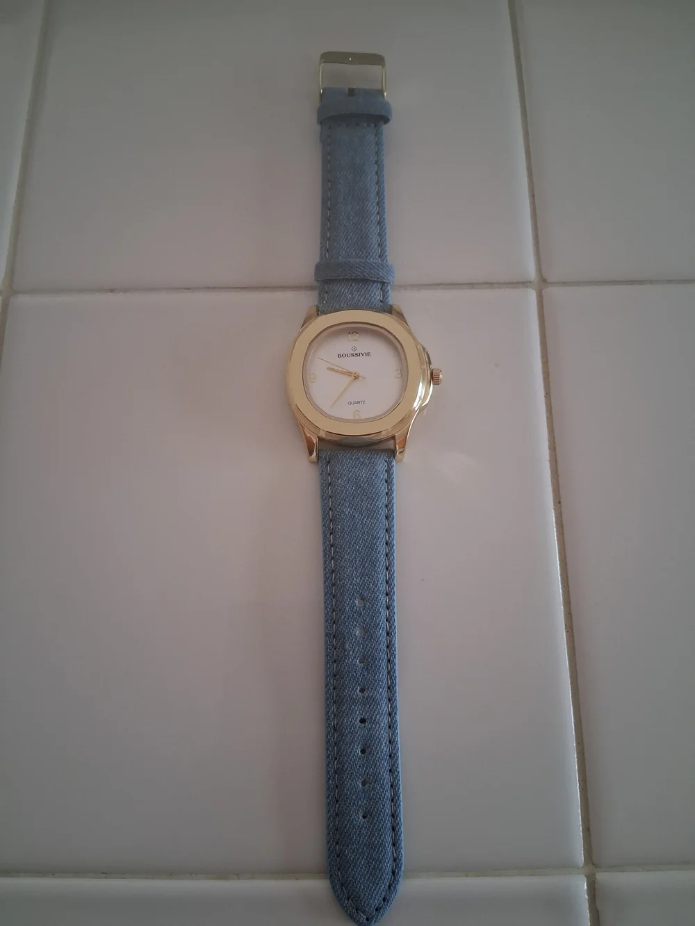 Gold-Tone Round Watch with Light Blue Fabric Strap